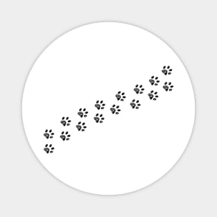 White paw prints trace Magnet